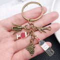 Four Finish Wine Opener Bottle Glass and Grape Keychains view 3