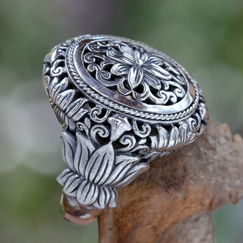 Antique silver openwork floral ring side angle showing lotus shoulders