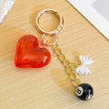 Translucent Red Heart White Bow Charm Gold-Tone Keychain view 2