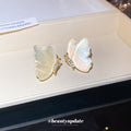 Iridescent Ivory Butterfly Stud Earrings with Metal Settings view 4
