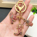 Brown Western Hat Boot Bottle and Star Metal Keychain Set view 3