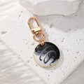 Gold Tone Round Marbled Swirl Enamel Clip Keychains in Six Colors view 6