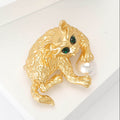 Textured Cat Playing Ball Brooch in Gold and Silver view 3