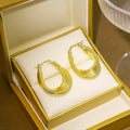 Gold Wire Spring Teardrop Hoop Earrings Coil Style Pair view 2