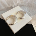Pair of Metal Tone Wide Polished C-Shaped Hoop Earrings in Two Sizes view 8