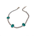Silver Tone Tennis Bracelet With Three Aqua Oval Stones view 5