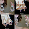 Pink Crystal Bow Teardrop Earrings with Reflective Details view 1