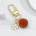 Wool Felt Ball Keychain With White Enamel Flower Charm And Gold-Tone Clasp view 12