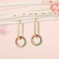 Gold Tone Rectangular Huggie Earrings with Crystal Charm Drops view 5