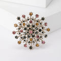 Multicolor Crystal Floral Burst Brooch With Silver Tone Frame view 1