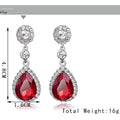 Red Silver Tone Red Teardrop Halo Crystal Four Designs Metal Dangle Earrings view 2
