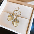 Round Cabochon Drop Earrings with Floral Metal Details view 7