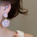 Lavender Flower Drop Earrings with Pearly Petals and Round Centers view 3