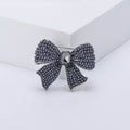 Crystal Bow Brooch with Center Stone in Three Metal Finishes view 2