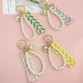 Embroidered Leaf Ribbon Wristlet Keychain With Pearl Bead Strap And Charm view 1