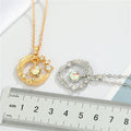 Crystal Crescent Leaf Wreath Pendant Necklaces in Gold or Silver Tone view 2