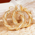 Gold Tone Triple Rope Twist Oversized Hoop Earrings view 2