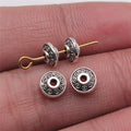 Round Patterned Large Hole Spacer Beads in Four Metal Tones view 1