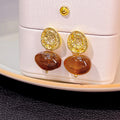 Brown Oval Textured Gold Tone Dangle Stud Earrings view 4