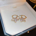 Gold Tone Crystal Star Hoop Earrings with Open Centers view 2