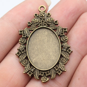 Antique Bronze Oval Cabochon Setting with Scrolled Edge