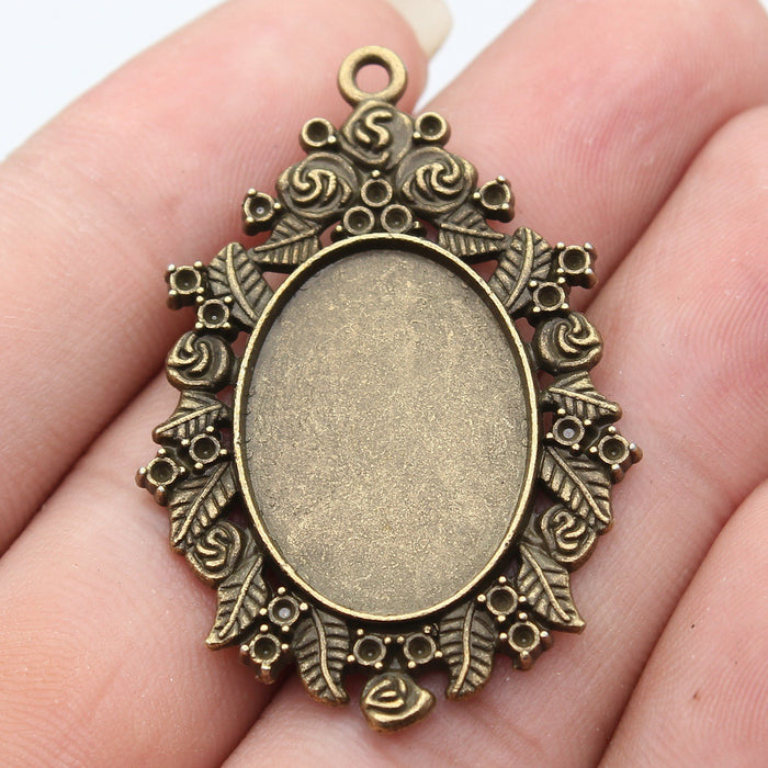 Antique Bronze Oval Cabochon Setting with Scrolled Edge