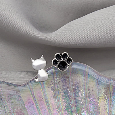 Primary supplied view of cat and paw mismatched stud earrings