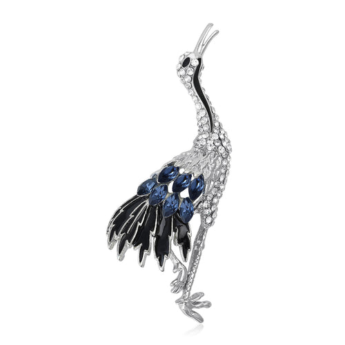 Front view of the colorful long leg crane brooch and its color options