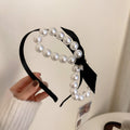 Six Hair Accessory Styles With Pearls Bows Flowers And Braids view 11