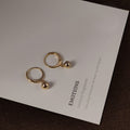 Gold Tone Small Round Ball Charm Huggie Hoop Earrings view 3