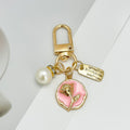 Gold Tone Crystal Charm Keychain With Faux Pearl Pendant view 9