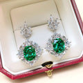 Green Oval Floral Halo Long Drop Earrings In Silver Tone view 3