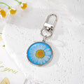 Round Resin Daisy Keychains Gold Silver Frames 6 Styles view 8