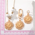 Gold Tone Smiling Sun Keychain Earrings and Pearl Necklace view 5