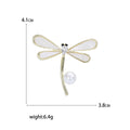 Gold Open Line Dragonfly Brooch With White Pearl Drop view 5