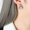 Geometric Twisted Hoop Earrings Gold And Steel Tone Pair view 6