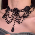 Black Beaded Floral Bib Necklace With Graduated Teardrop Fringe view 3