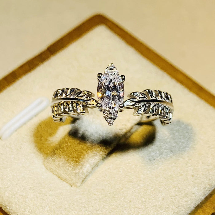 Silver-Tone Feather Band Ring with a Marquise Clear Stone
