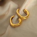 Bold Sculpted Open Hoop Earrings in Polished Gold Tone view 2