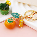 Persimmon and Orange Fortune Charm Keychains in Eighteen Pictured Designs view 10