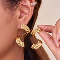 Hammered S Curve Statement Stud Earrings in Polished Gold Tone view 2