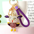 Crowned Winged Pig Keychains with Braided and Bare Wrist Loops view 3