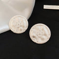 Embossed Floral Disc Stud Earrings in Silver or Gold Tone view 6