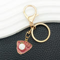 Baseball Glove and Mixed Sports Metal Clasp Keychain Set view 2