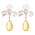 White Enamel Flower Stud Earrings With Yellow Drops view 5