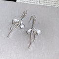 Silver Bow Hook Earrings in Polished Statement Design view 6