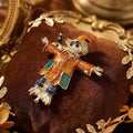 Jeweled Scarecrow Brooch With Orange Coat and Blue Pants view 3