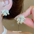 White Floral Dangle Stud Earrings in Two Daisy Styles view 3