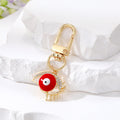 Gold Tone Openwork Lash Enamel Evil Eye Clip Keychains in Five Colors view 4