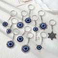 Silver Blue Evil Eye Keychains Multiple Frame Shapes view 1